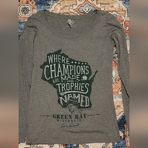 Green Bay Packers “Champions Are Made, Trophies Are Named” T-Shirt
